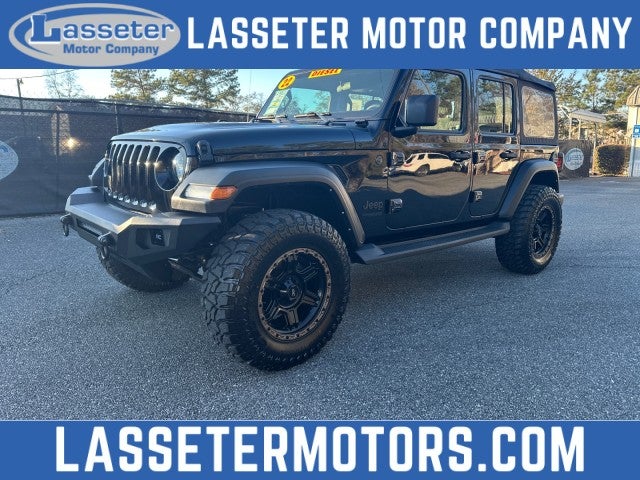 2022 Jeep Wrangler Unlimited Sport in Black — front three-quarter view