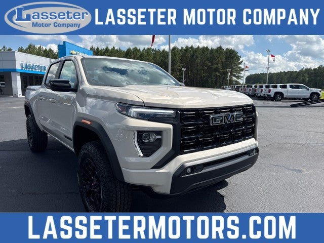 2026 GMC Canyon Elevation in Coastal Dune — front three-quarter view